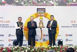 Top leader rings opening bell at Indias National Stock Exchange