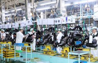 Manufacturing thrives in May despite cost pressures