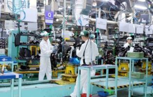 Manufacturing growth slows slightly in September