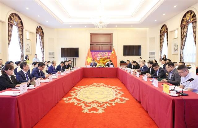 Việt Nam, China boost cooperation in green industry development