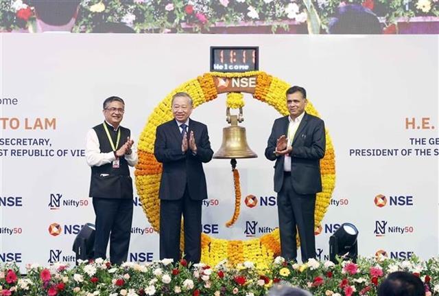 Top leader rings opening bell at Indias National Stock Exchange