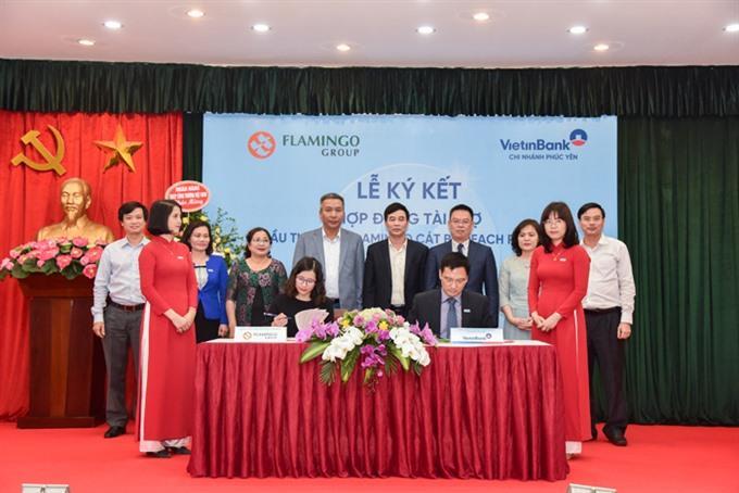 Flamingo, VietinBank ink investment agreement