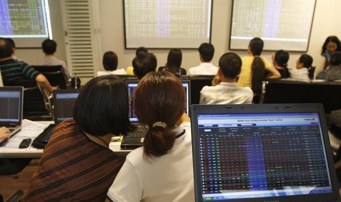 Shares start week with declines banks hard-hit