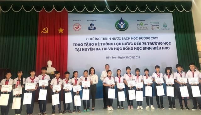 Novaland provides water filter systems, rainwater tanks to schools in Ben Tre