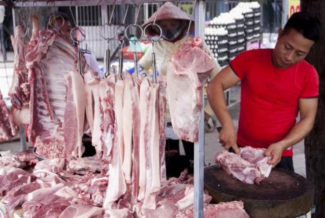 Pork prices fall as VN steps up imports, demand declines