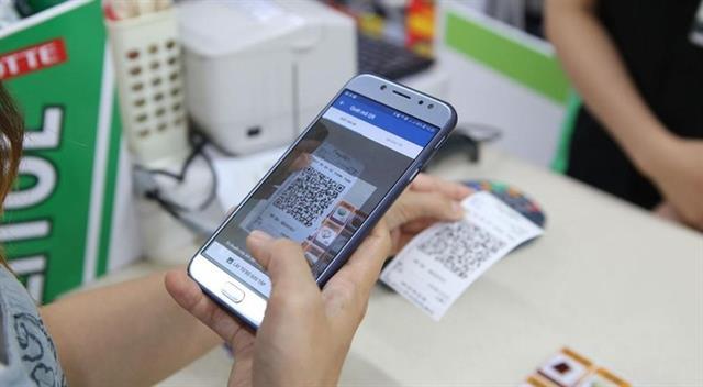 Central bank delays foreign ownership cap in payment services industry