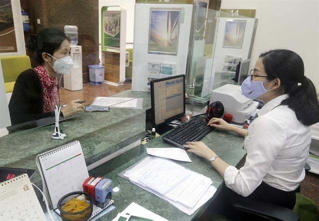 Credit institutions asked to tighten loans in overheating sectors: SBV