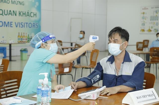 Nearly 500 SABECO employees inoculated in HCM Citys largest-ever COVID-19 vaccination drive