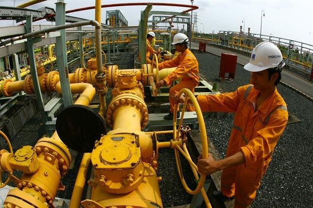 Shares eke out a gain on growth of energy stocks