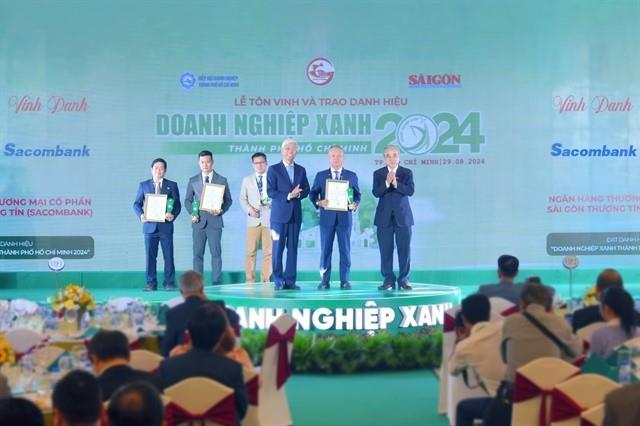 98 firms honoured with HCM City Green Businesses title